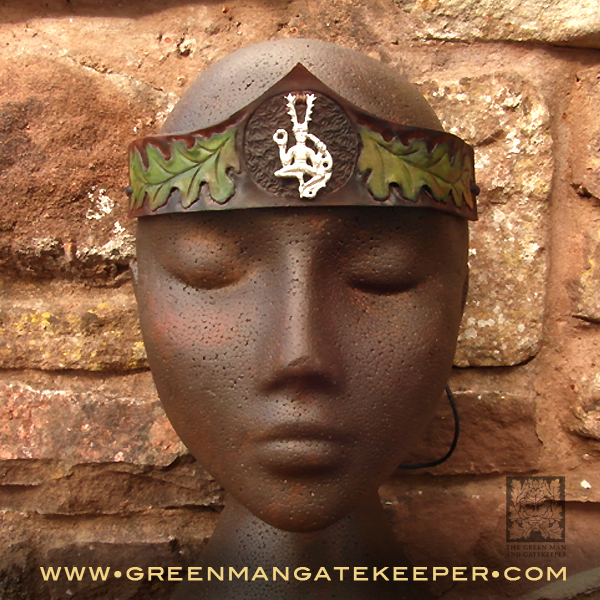 Cernunnos Head Band  Tied with a cord.  Made from hand coloured oak tanned leather with a hand cast pewter figure of Cernunnos.